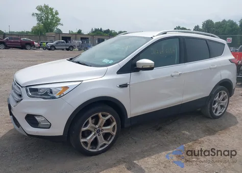 2019 Ford Escape Titanium из США, поврежденный, VIN 1FMCU9J90KUA86338
